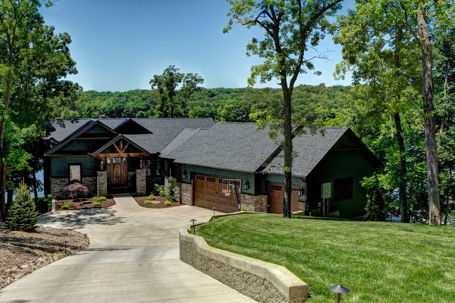 A large house with a driveway leading to it