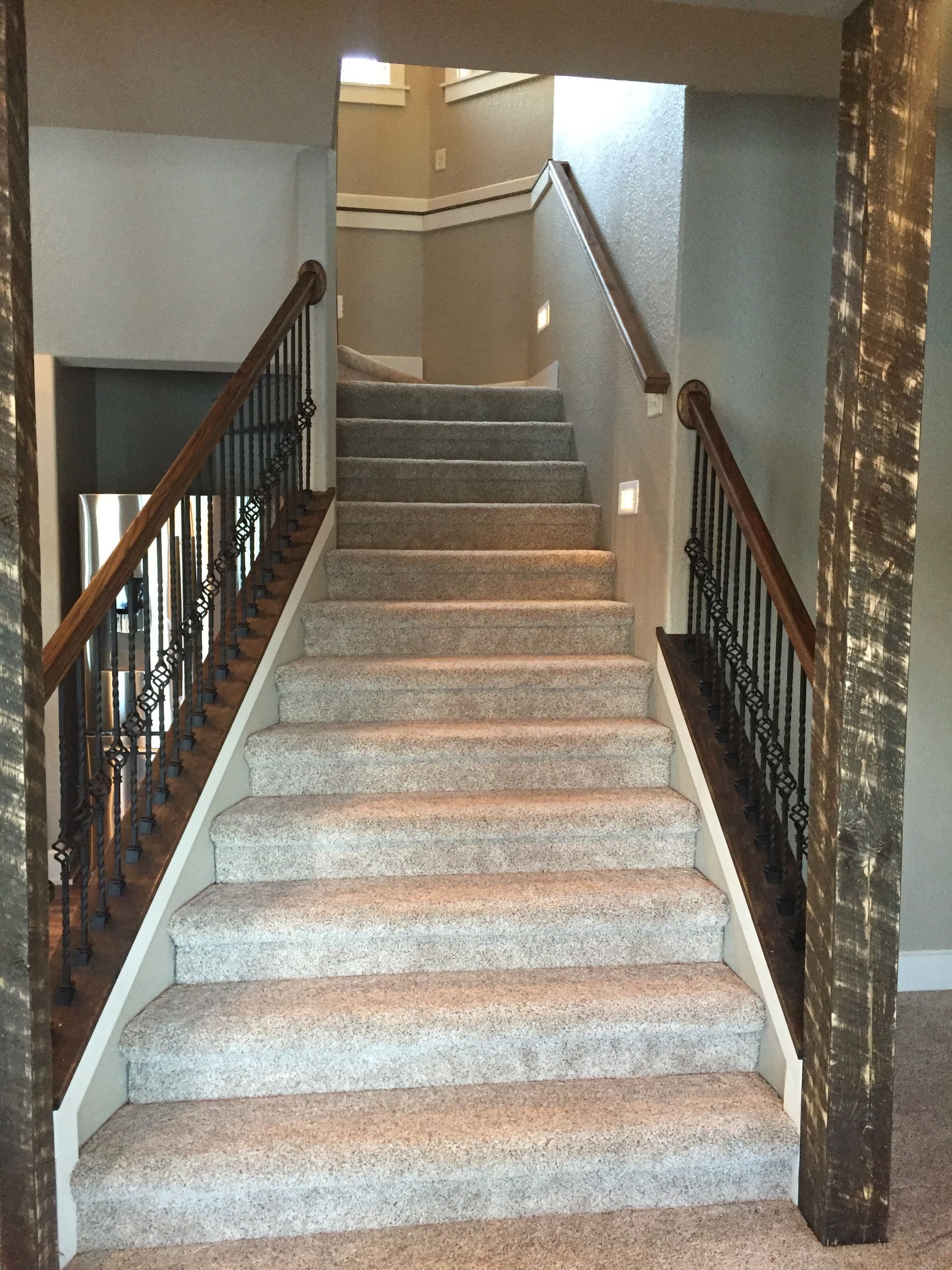 A set of stairs leading up to a second floor in a house.