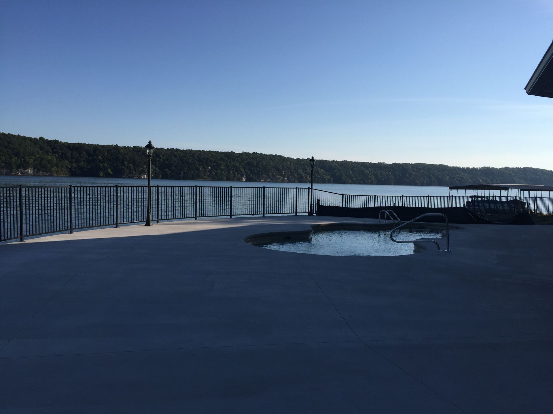 There is a swimming pool in the middle of the water.