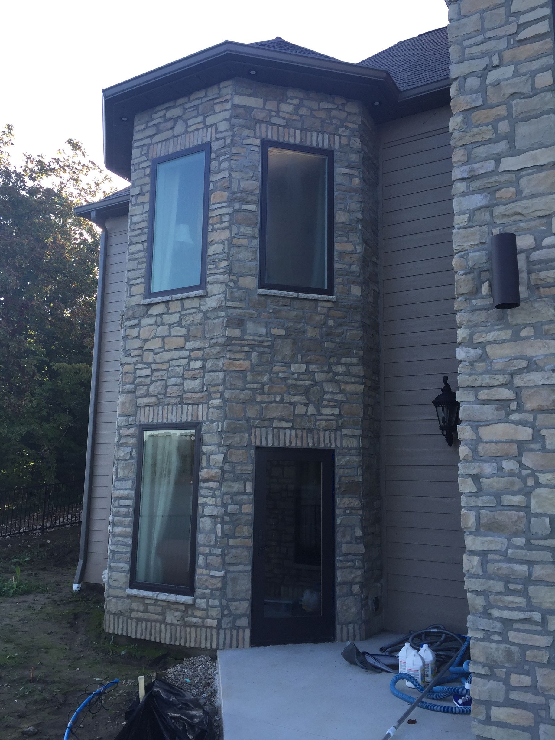 A large stone building with a lot of windows