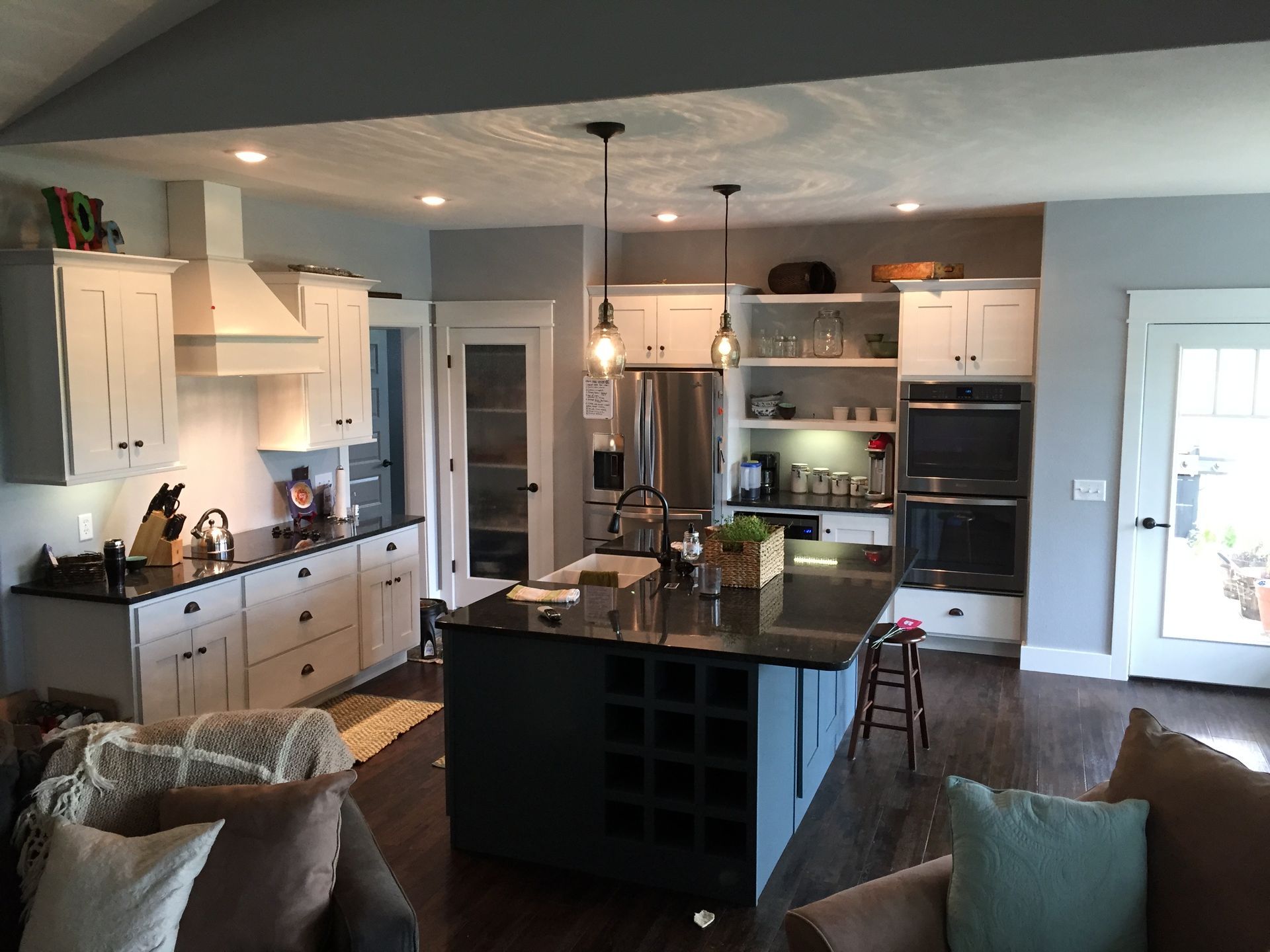 The kitchen is open to the living room and has a large island in the middle.