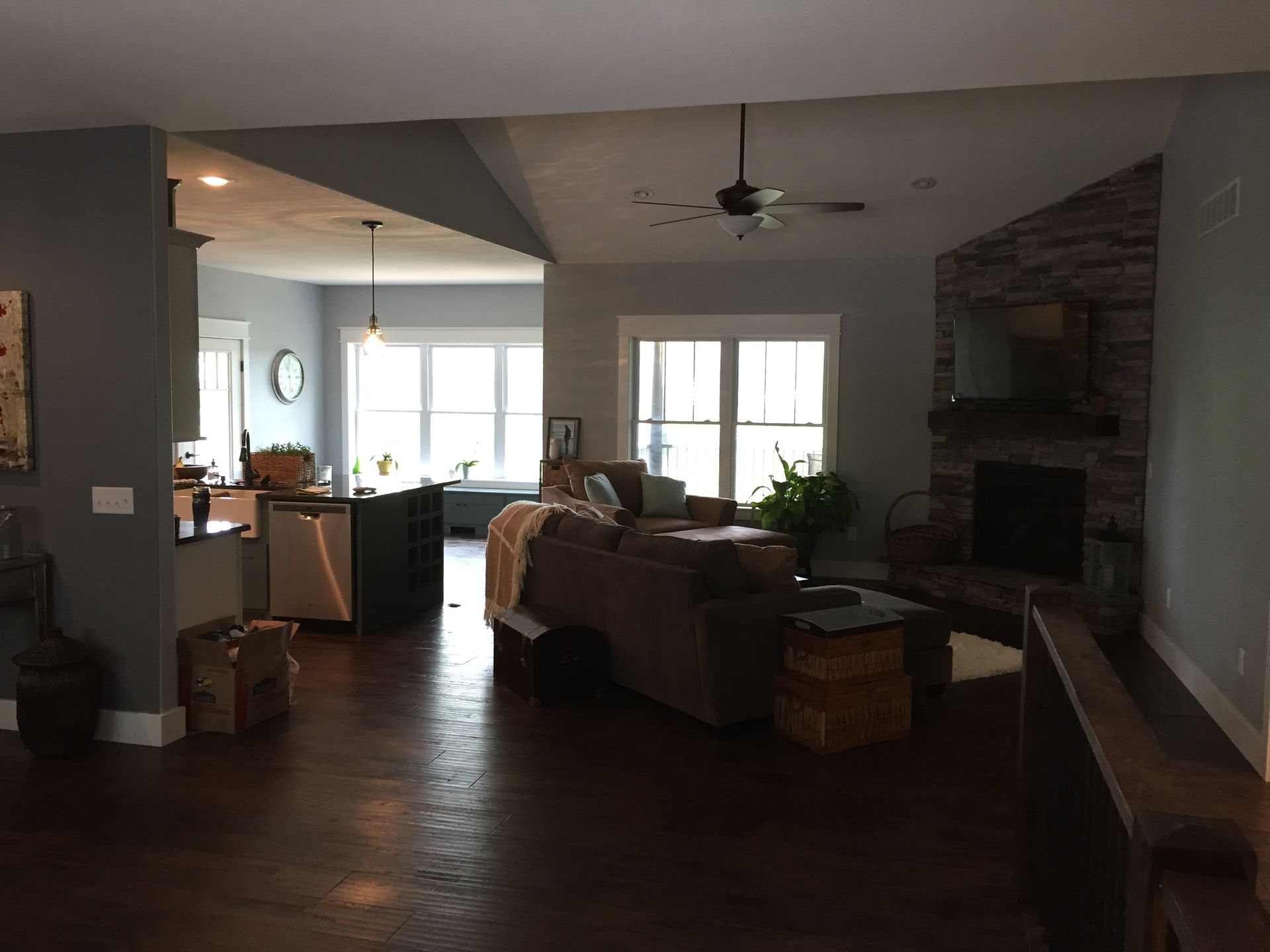 A living room filled with furniture and a fireplace.