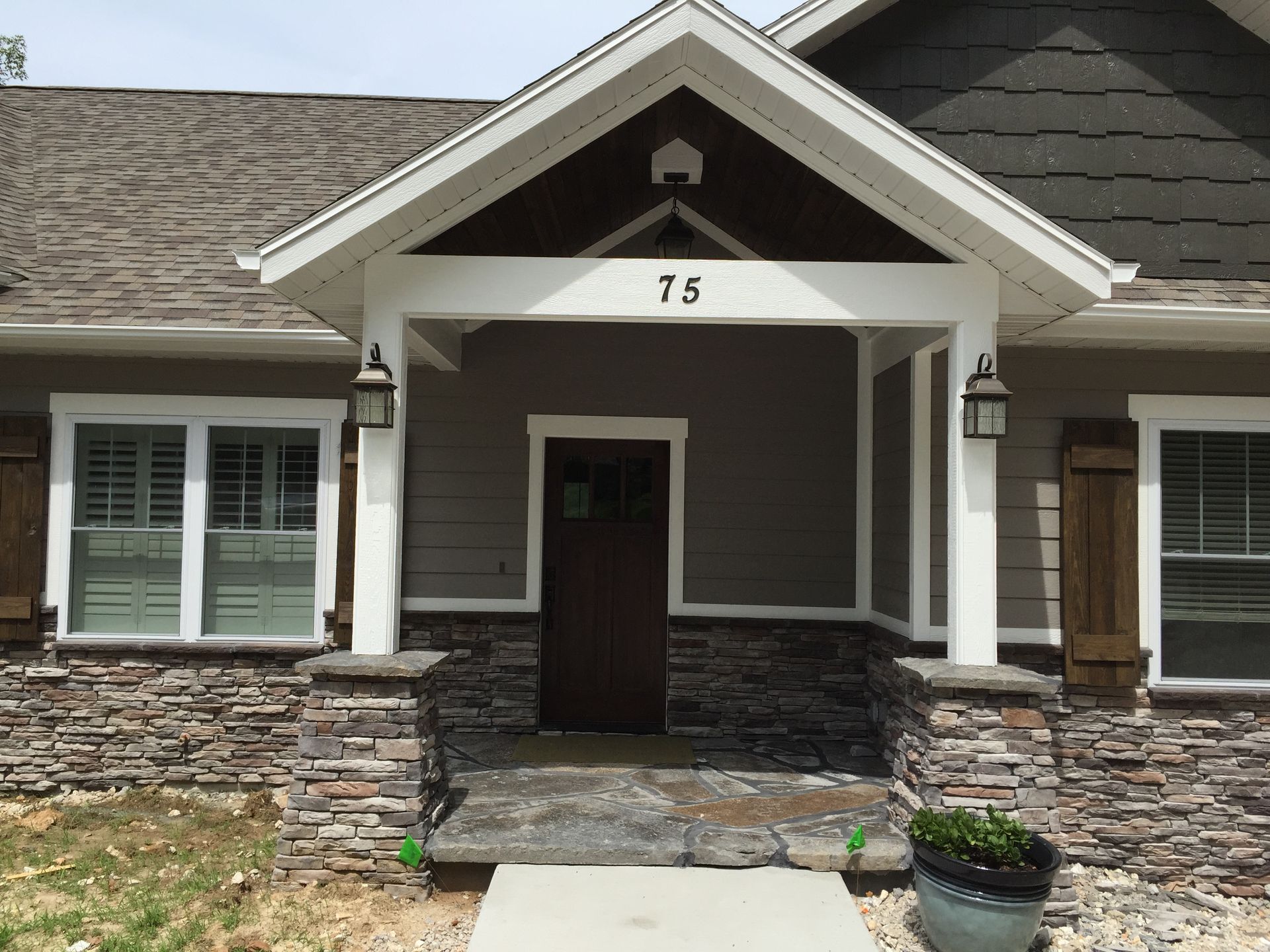 A house with the number 15 on the front of it