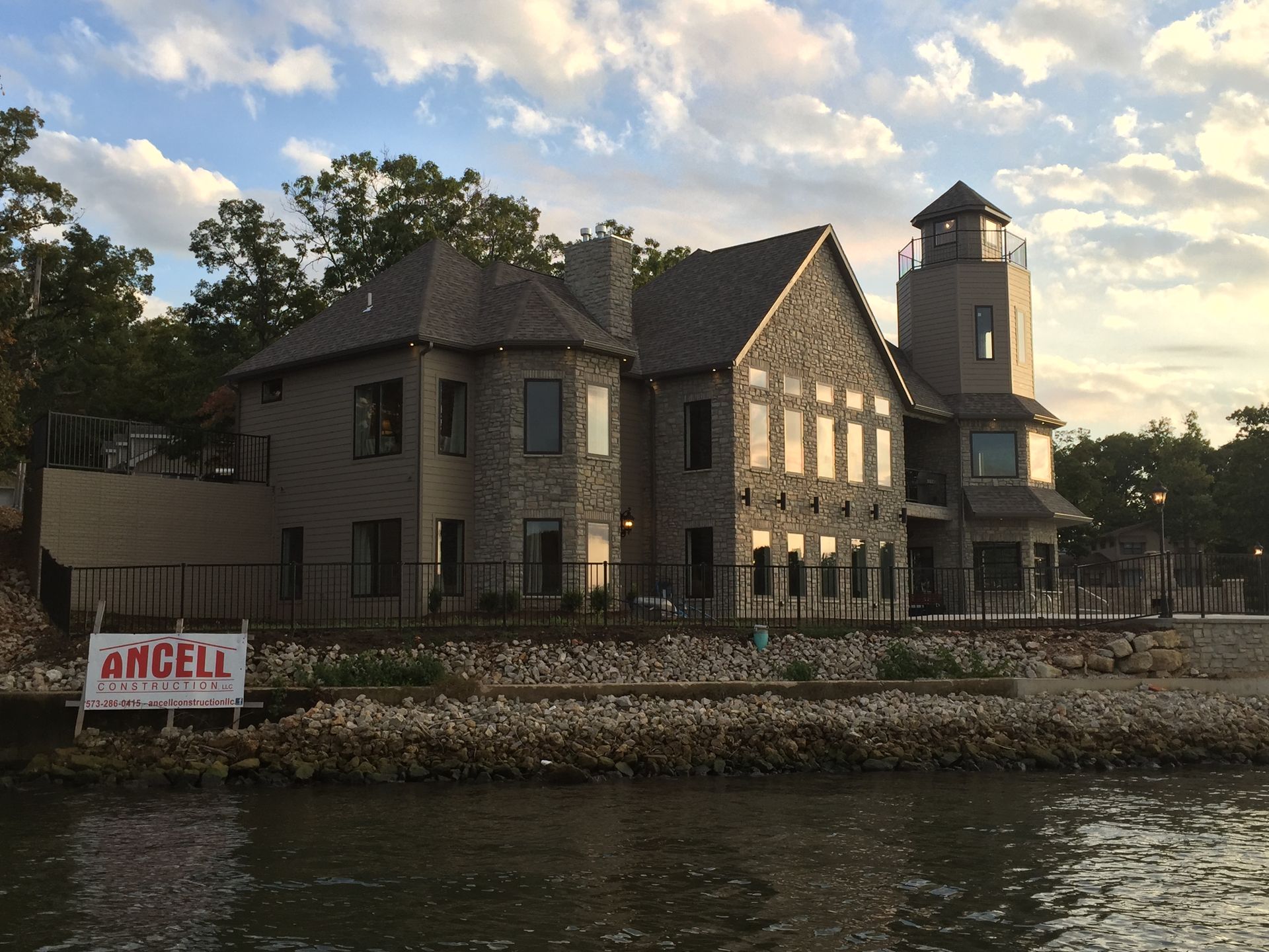 A large house with a sign that says angeli on it