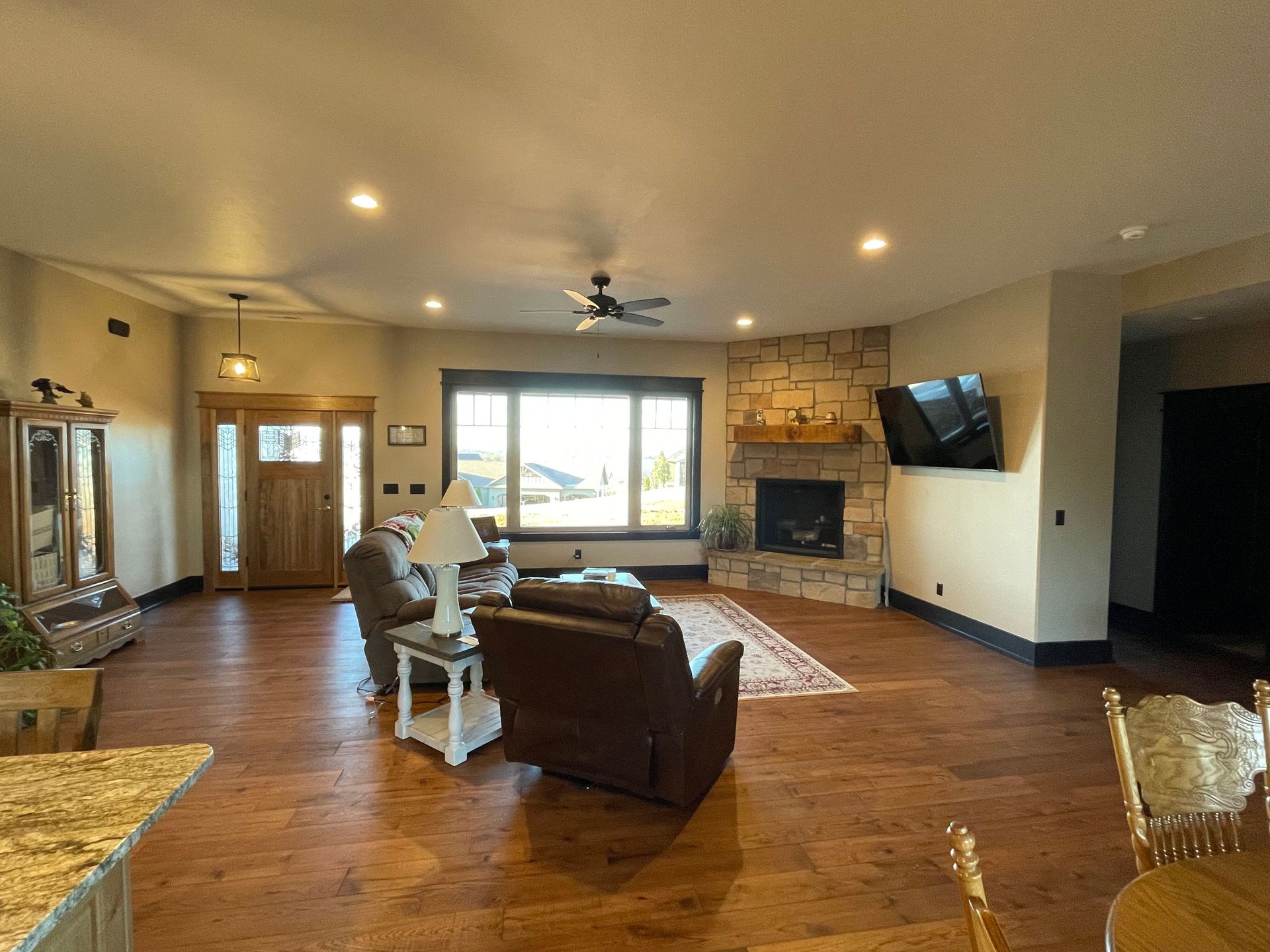 A living room filled with furniture and a fireplace.