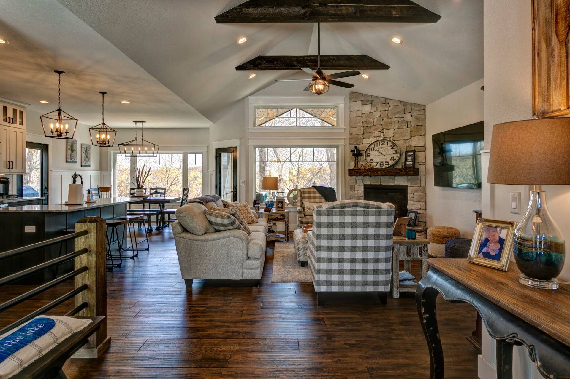 A living room filled with furniture and a fireplace.