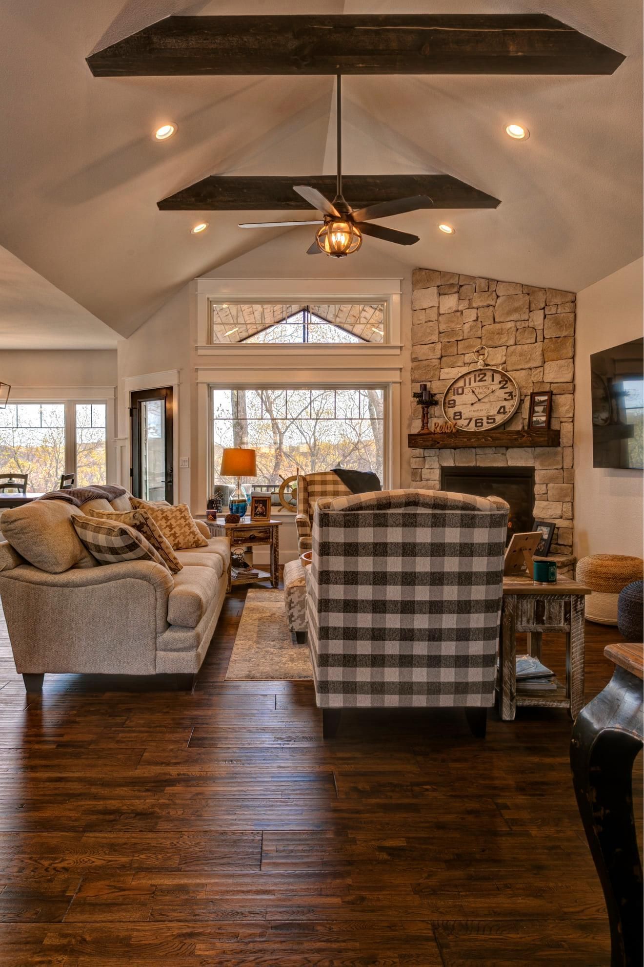A living room filled with furniture and a fireplace.