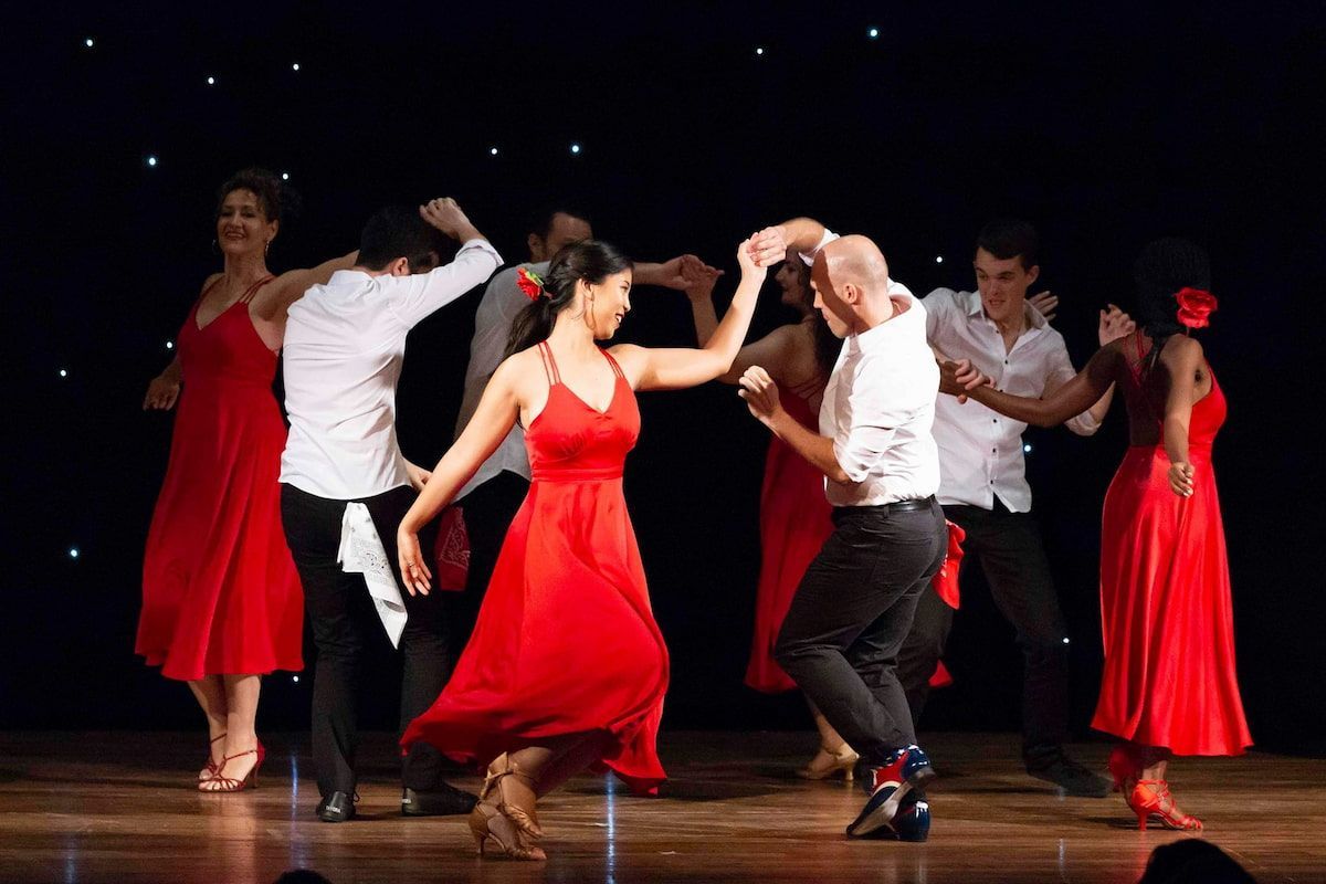 A Group Of People Are Dancing On A Stage — Global Dance Collective In West End, QLD