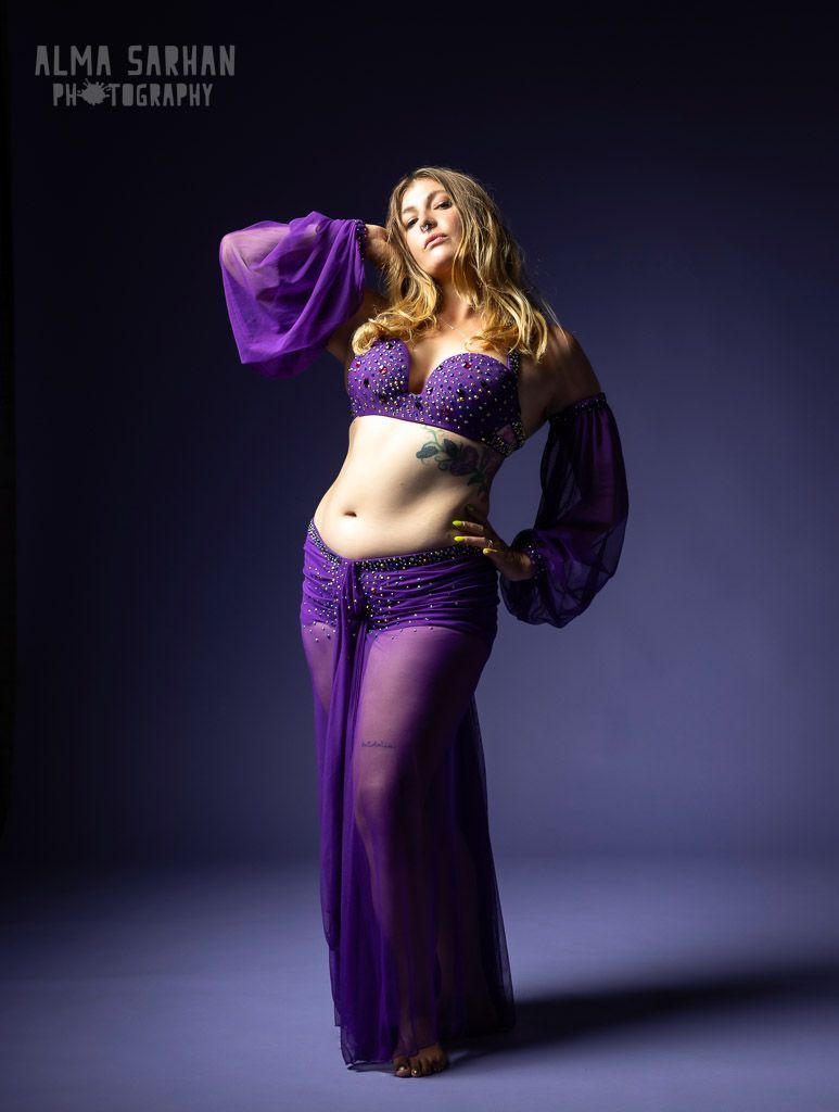 A Woman in a Purple Belly Dance Outfit — Global Dance Collective in West End, QLD