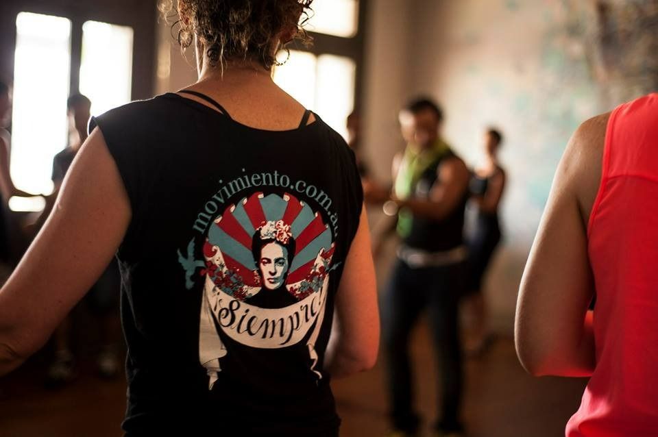 A Woman Wearing A Black Shirt With A Picture Of Frida Kahlo On It — Global Dance Collective In West End, QLD