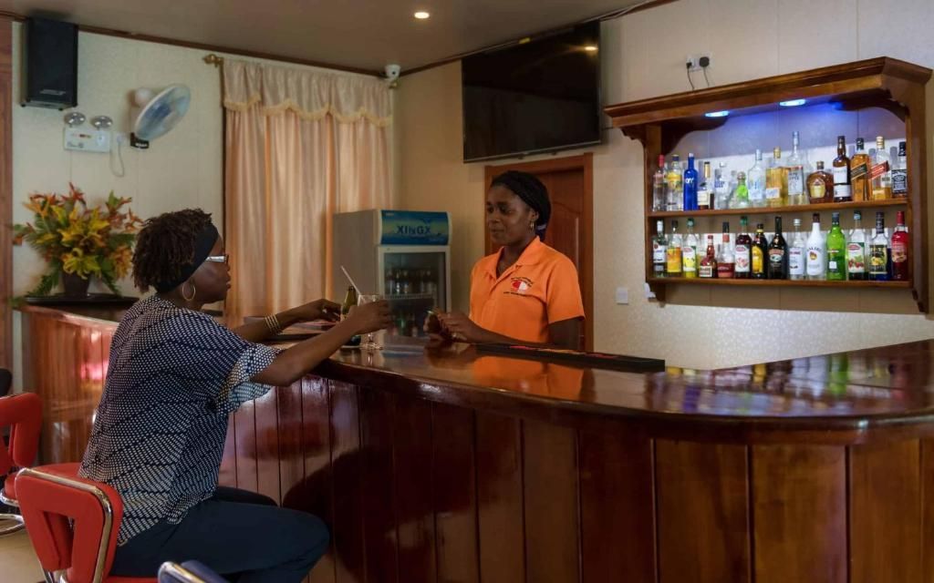 A beach with chairs and umbrellas on it