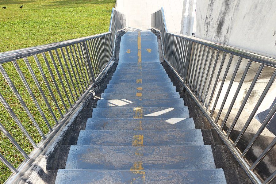 stair with yellow marking on the middle