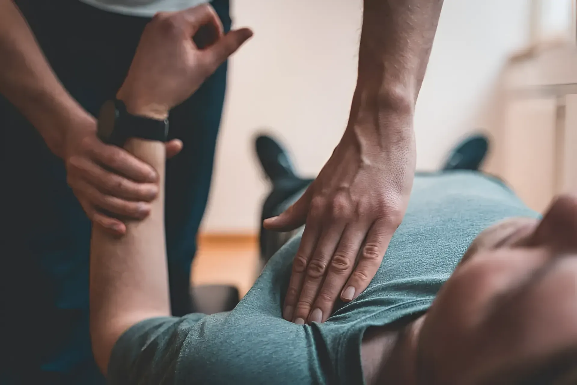 Person Receiving Arm and Shoulder Treatment — Barolin Physiotherapy Services in Bundaberg South, QLD