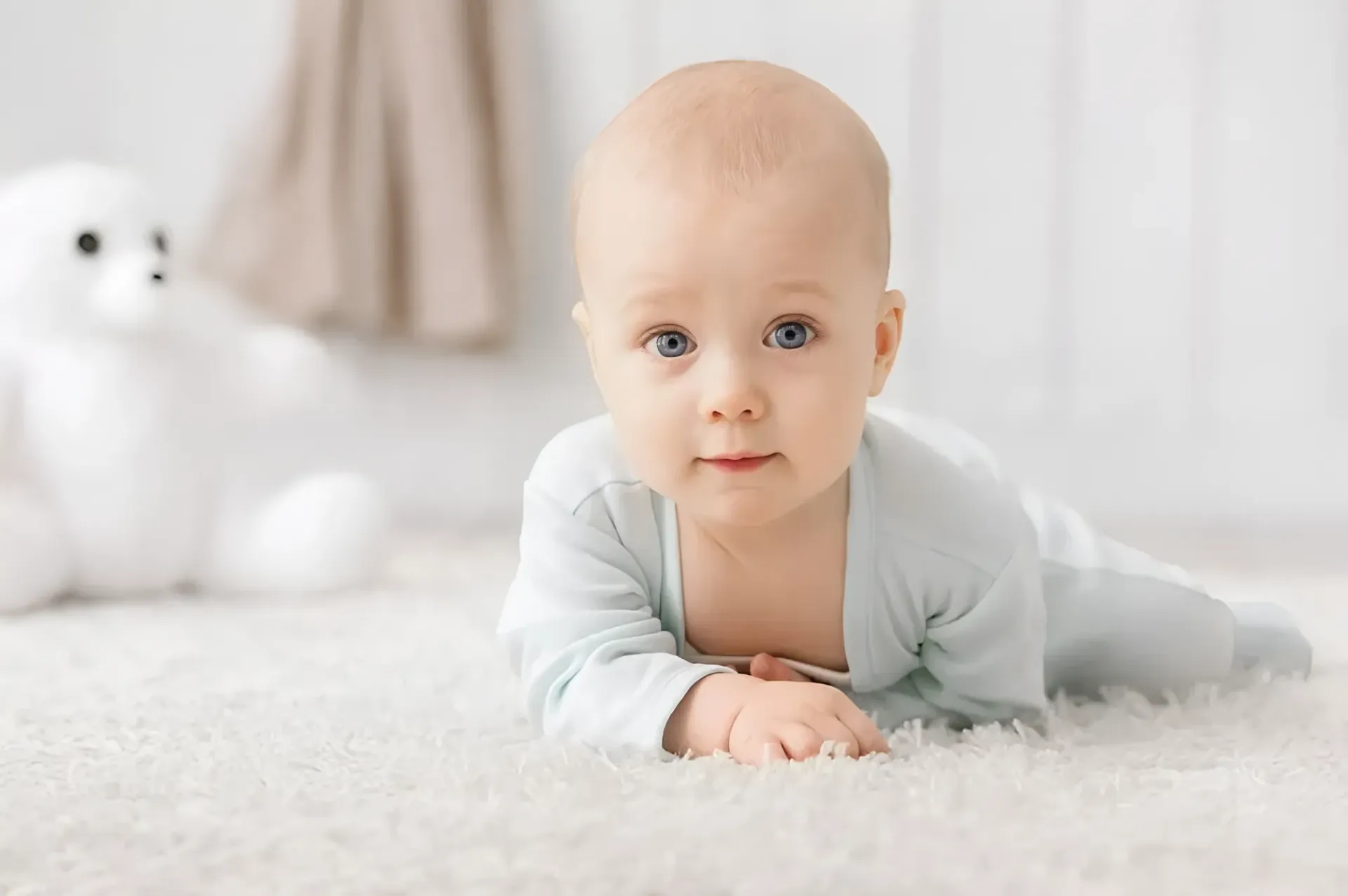 Baby on White Carpet, Looking Forward With Arms Outstretched — Barolin Physiotherapy Services in Bundaberg South, QLD