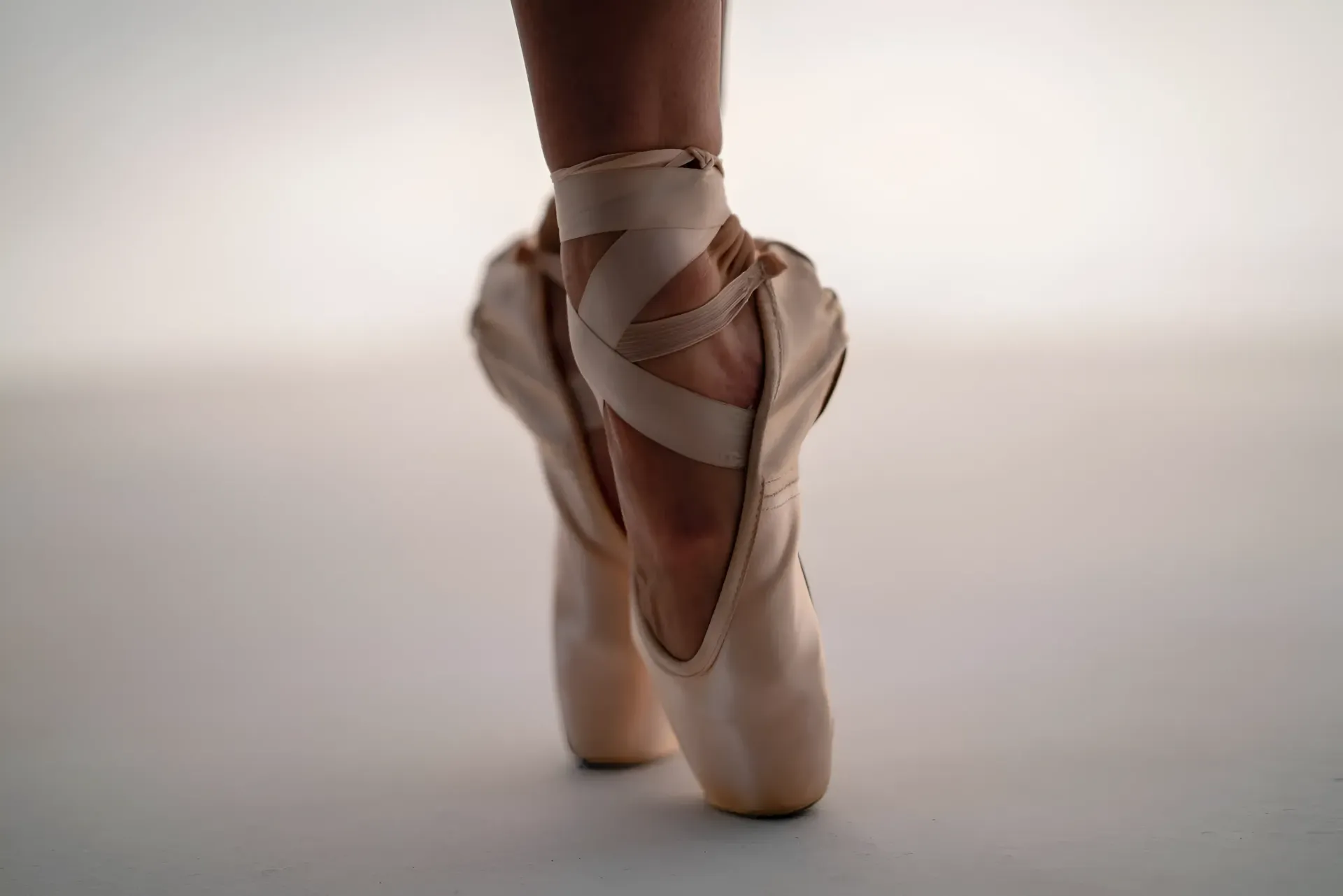 Ballet Dancer's Feet in Pink Pointe Shoes, en Pointe — Barolin Physiotherapy Services in Bundaberg South, QLD