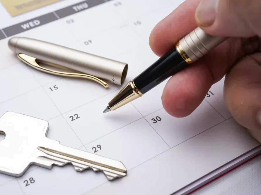 A Person With a Pen and Calendar — Money Spider Conveyancing In Katherine, NT