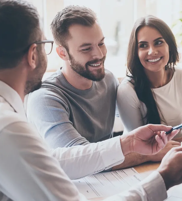 Couple Meeting With A Property Conveyancer — Money Spider Conveyancing In Alice Springs, NT