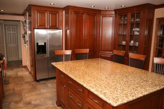 A kitchen with stainless steel appliances and granite counter tops