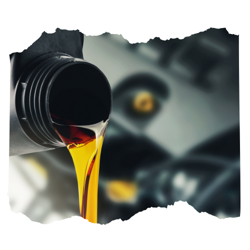 A bottle of oil is being poured into a car engine.