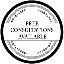 A circular black-and-white graphic with laurel borders reading 
