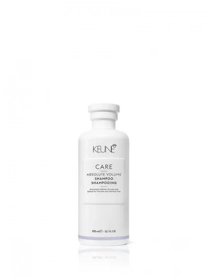 White bottle of Keune Care Absolute Volume Shampoo.