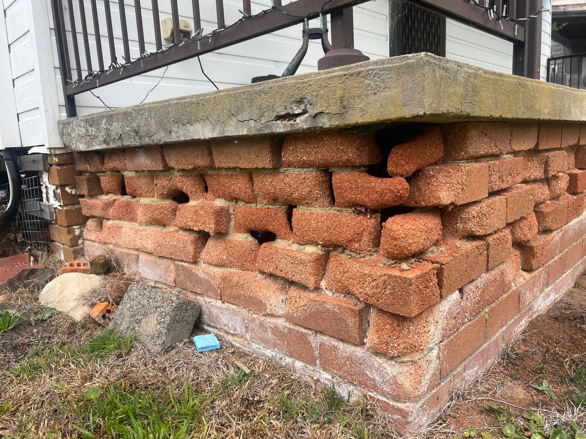 A Close Up Of Bricks Dismounting On a Corner View Of A Raised Floor— Heritage Bricklaying & Remedial Services In Jilliby, NSW
