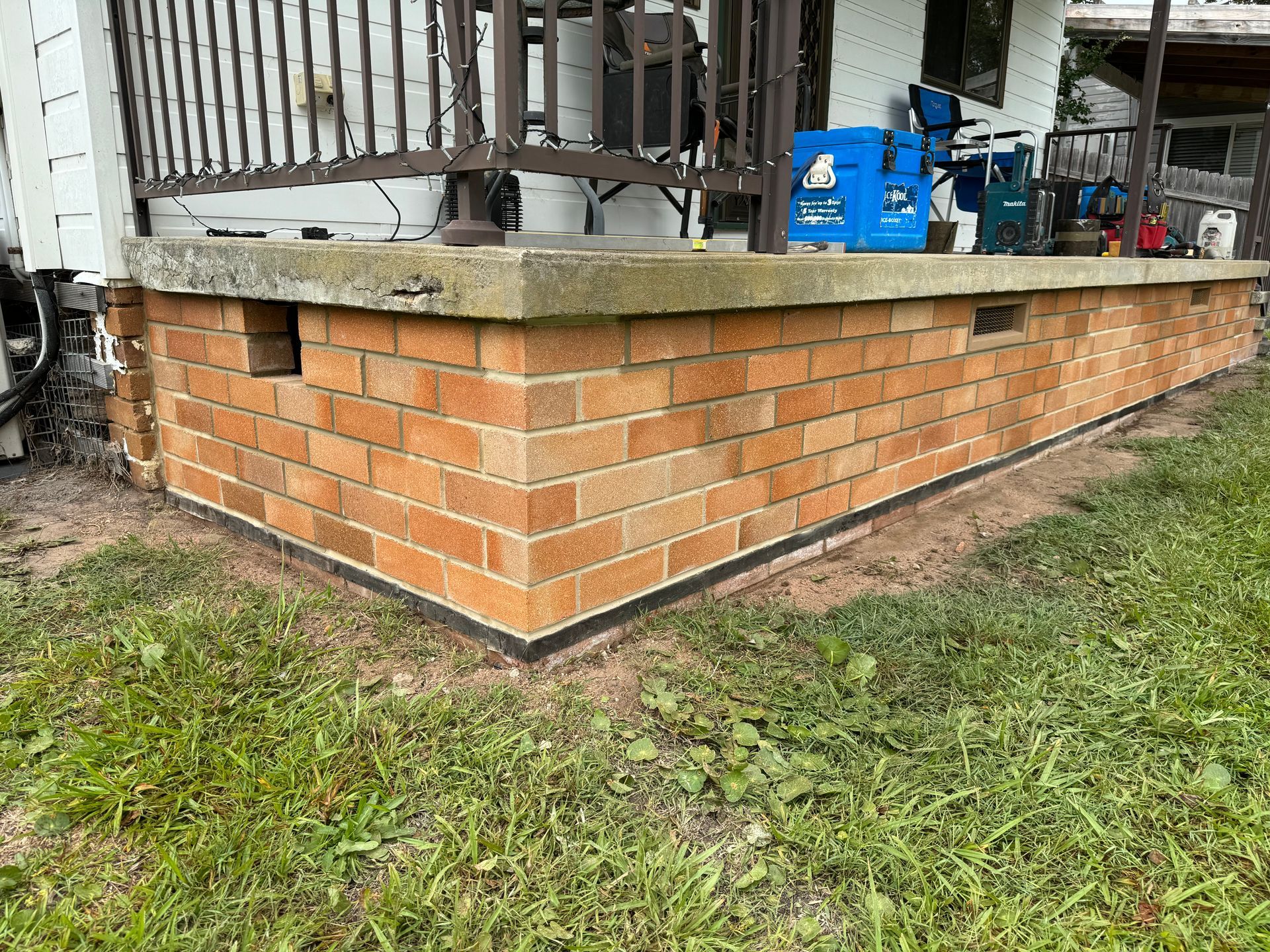 A Restored Brick Wall With Subfloor Vents — Heritage Bricklaying & Remedial Services In Jilliby, NSW