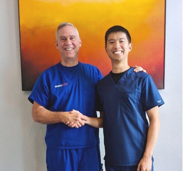 Best cosmetic, restorative, and general dentists shaking hands in Friendswood TX