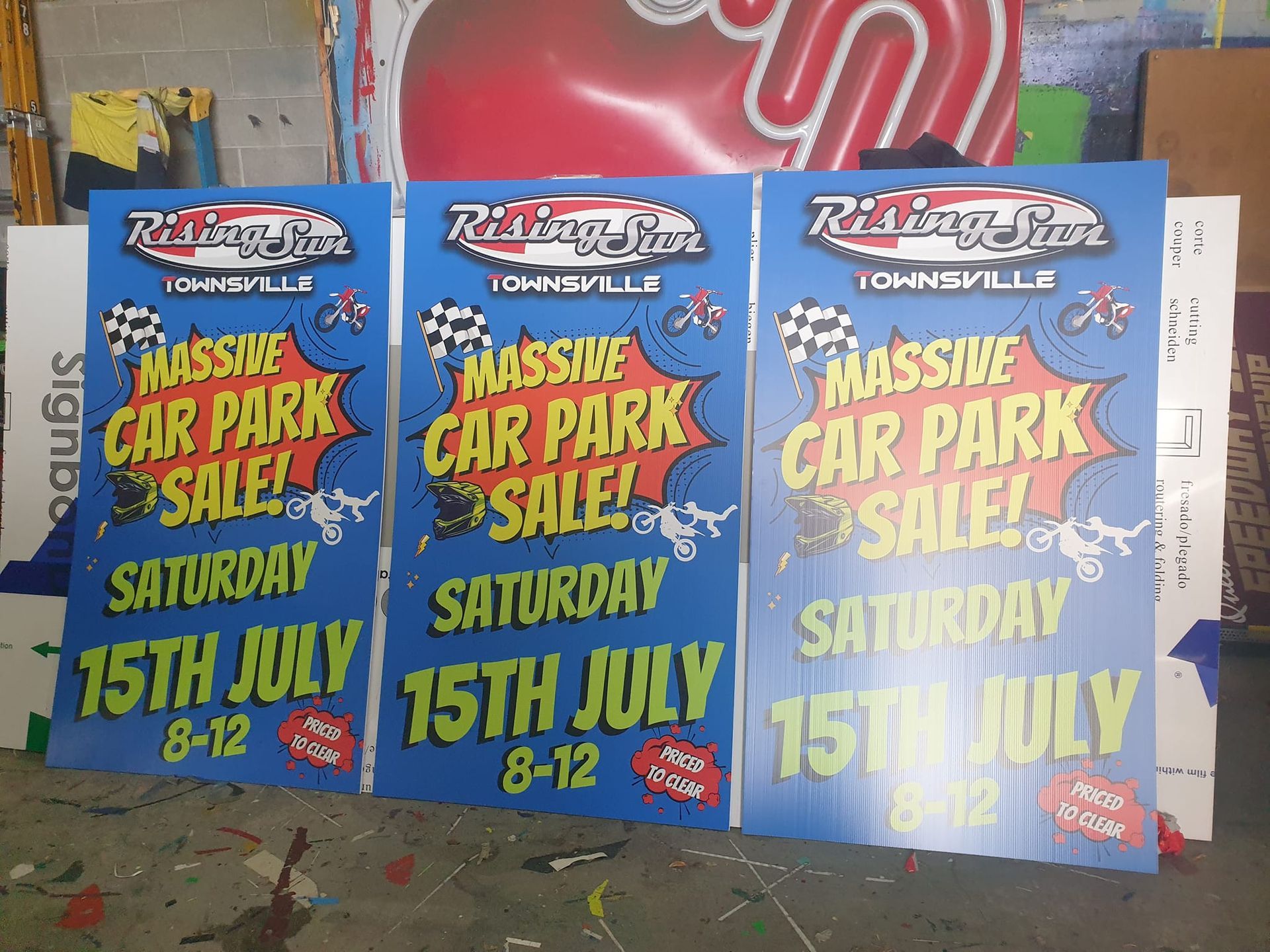 Three signs for massive car park sale on saturday 15th july