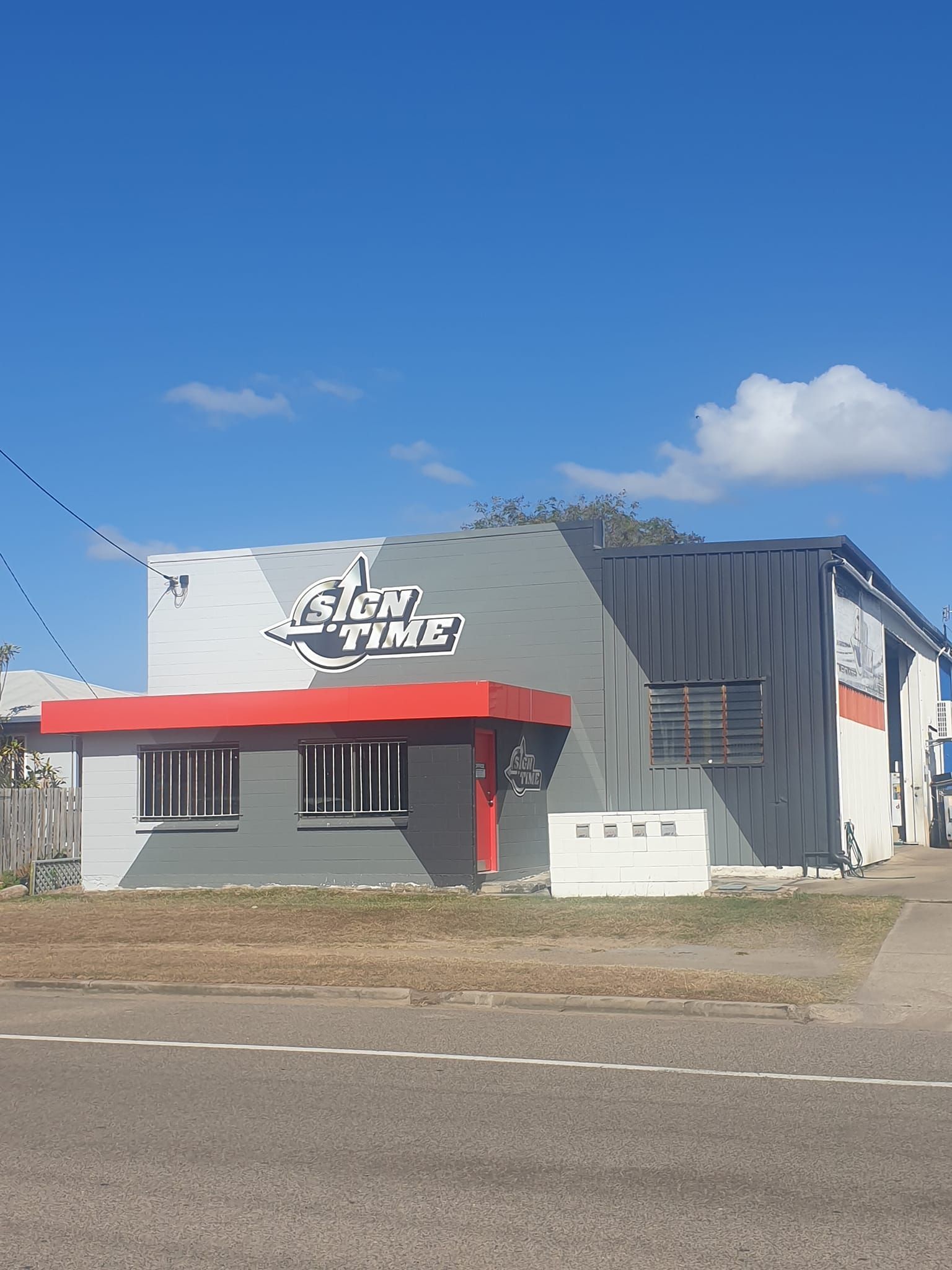 A building with a sign on the side that says eight times