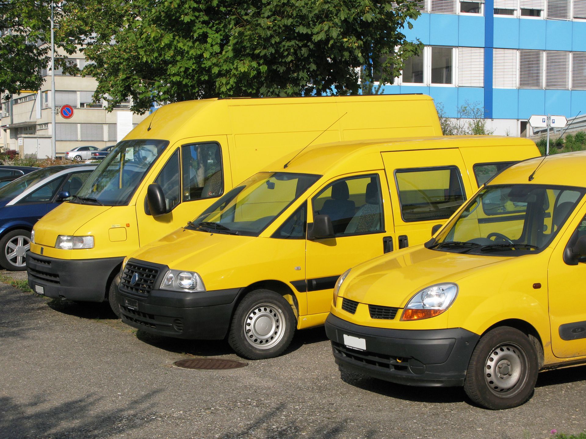 A row of yellow service cars.