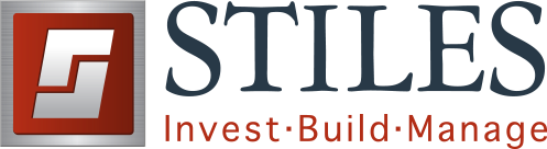 Stiles logo with red square icon and “Invest·Build·Manage” tagline.