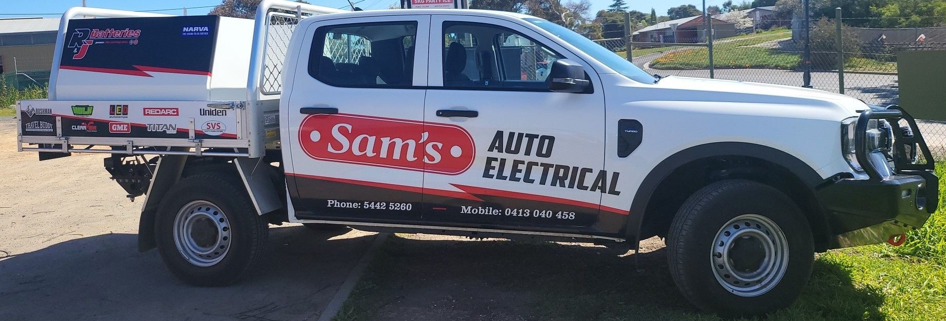 Two Black Boxes Are Stacked on Top of Each Other on a Shelf — Sam’s Auto Electrical In Golden Square, VIC