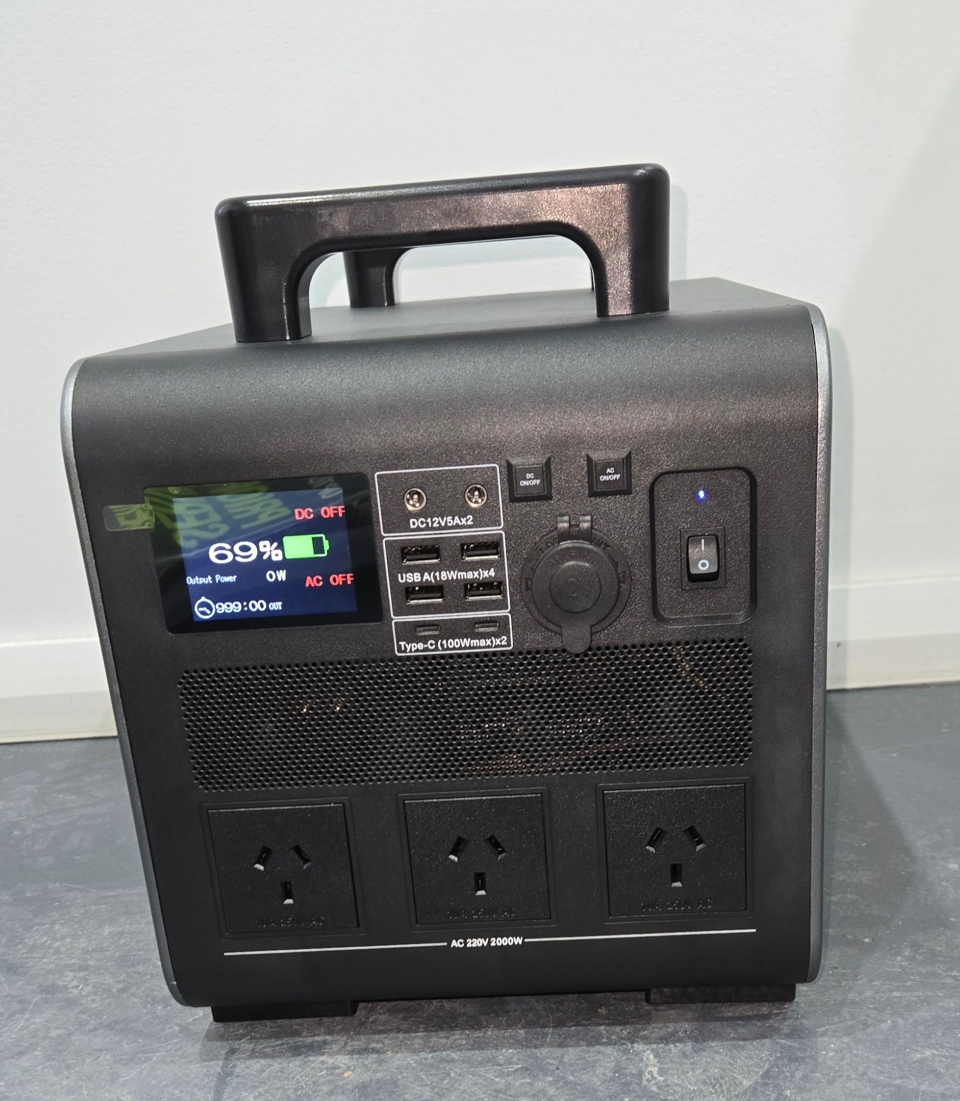 A Black Battery Box With a Handle is Sitting on a Table — Sam’s Auto Electrical In Golden Square, VIC