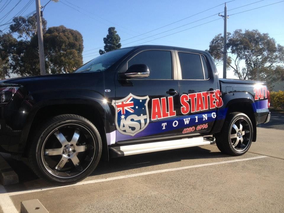 An All States Towing Truck Is Parked In A Parking Lot — Capital Signs in Goulburn, NSW