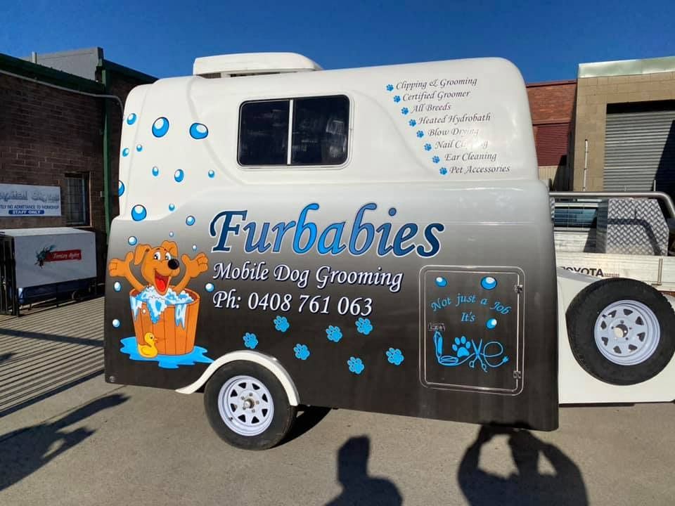 A Trailer With Furbabies Mobile Dog Grooming Written — Capital Signs in Goulburn, NSW