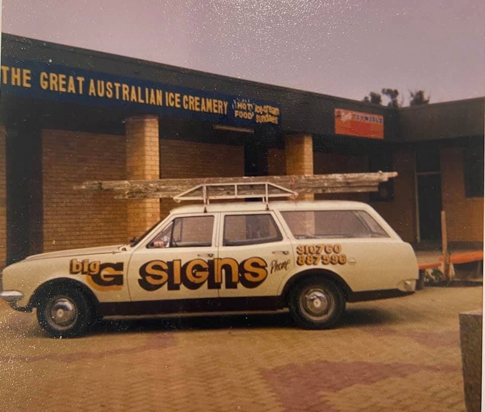 A White Van With The Word Signs On The Side Is Parked In Front Of A Building — Capital Signs in Fyshwick, ACT
