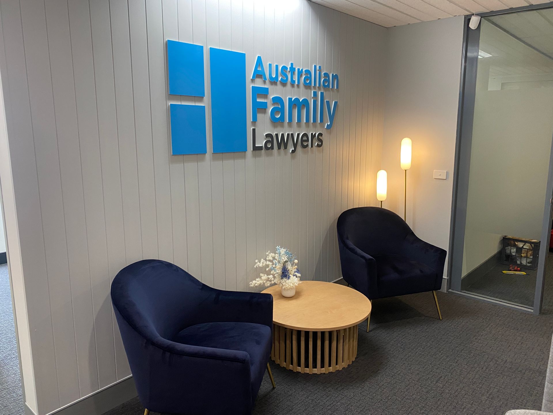 Reception Area of Australian Family Lawyers with Blue Chairs — Capital Signs in Fyshwick, ACT
