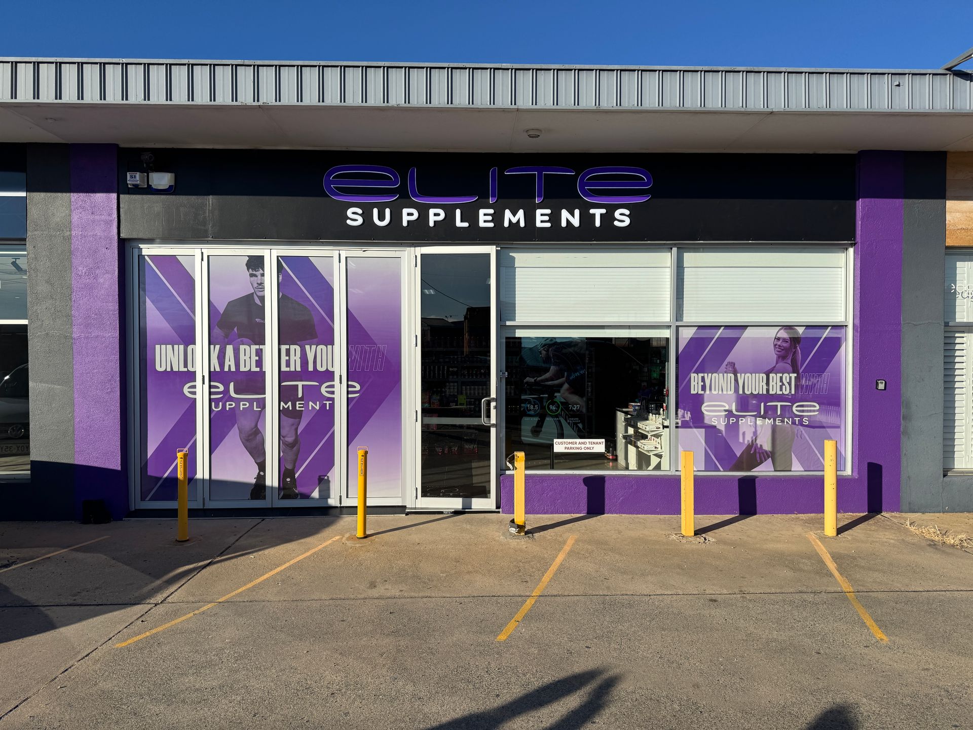 Elite Supplements Storefront with Purple and White Accents — Capital Signs in Fyshwick, ACT