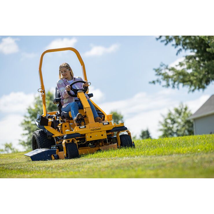 woman mowing with a cub cadet