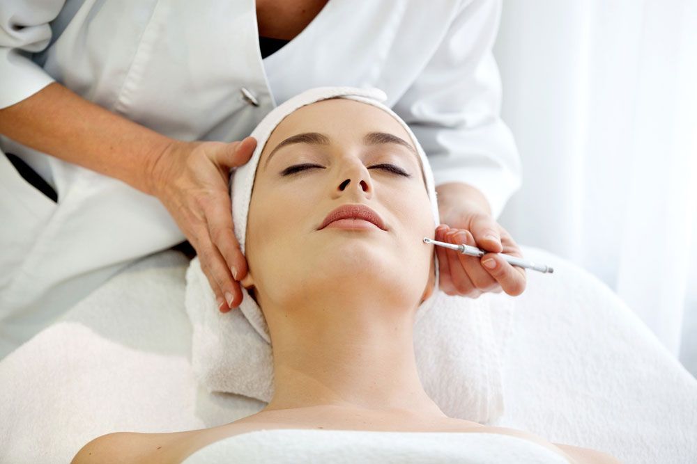 Woman getting facial therapy — Shepparton Skin & Body
