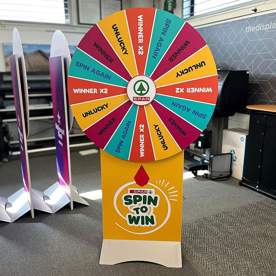 Promotional spin wheel featuring branded artwork & rewards