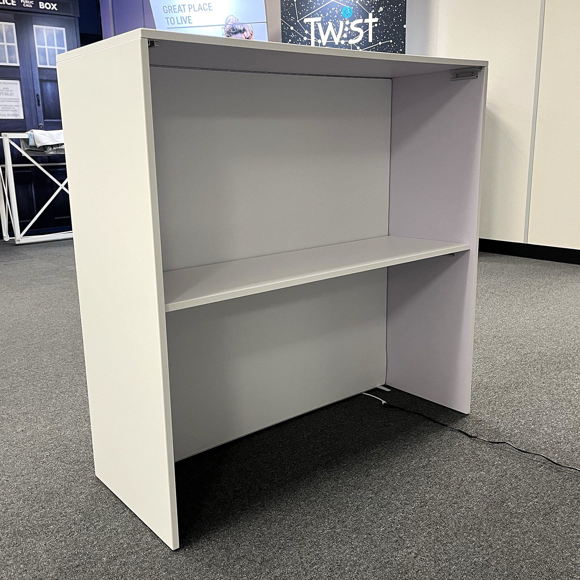 Illuminated podium plinth