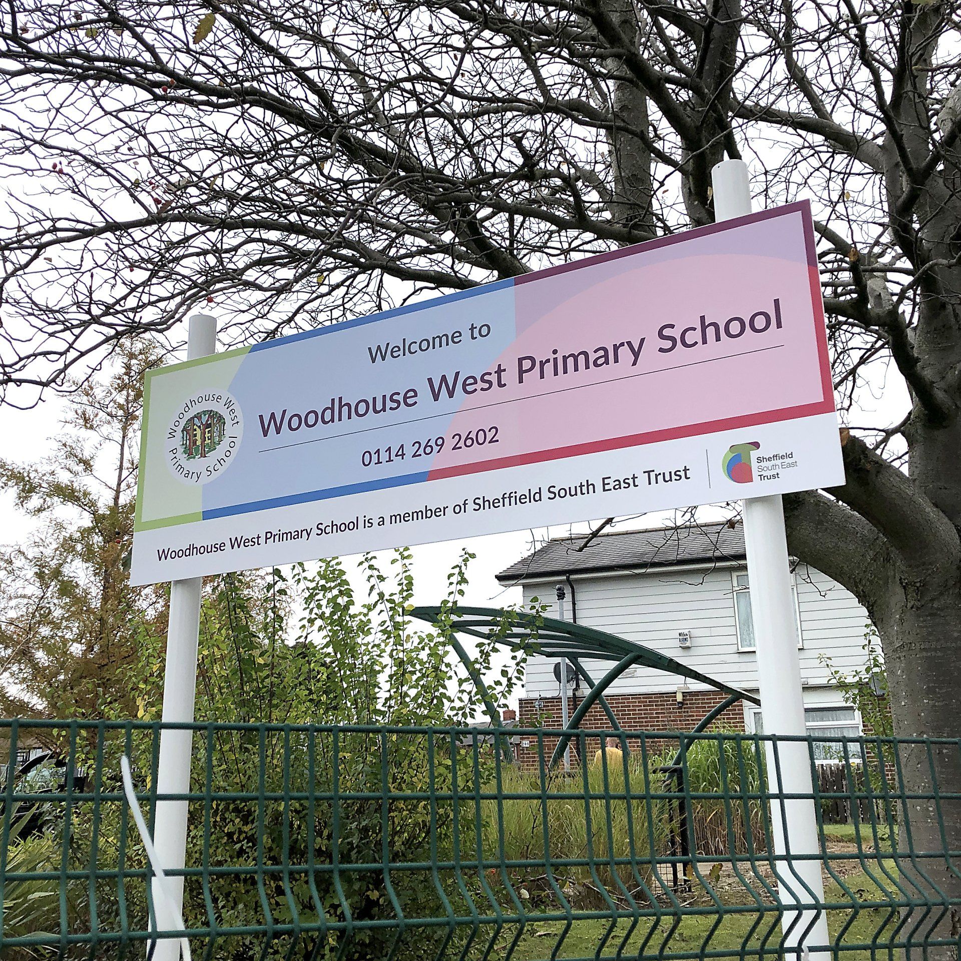 Painted post and rail sign