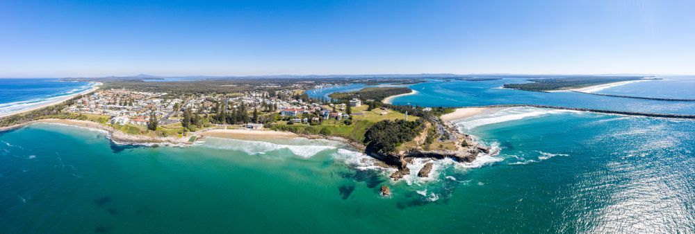 An Aerial View of a Small Island in the Middle of the Ocean — Doggy Diva Grooming In Iluka, NSW