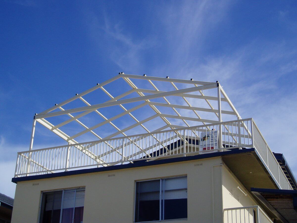 A house constructing a balcony on top of it