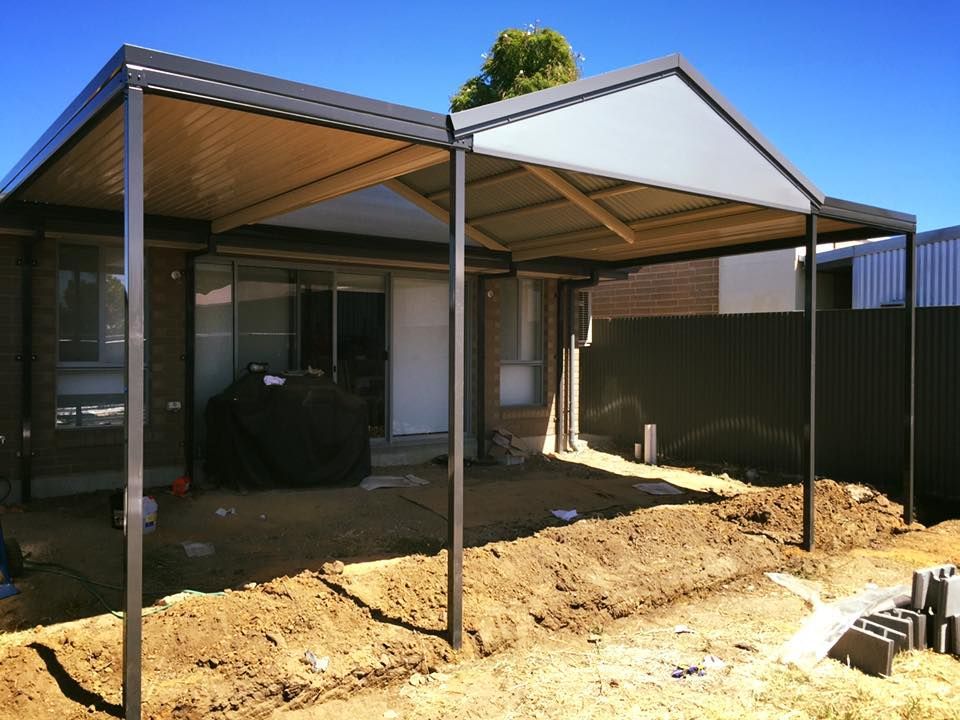 A house with a covered area in front of it