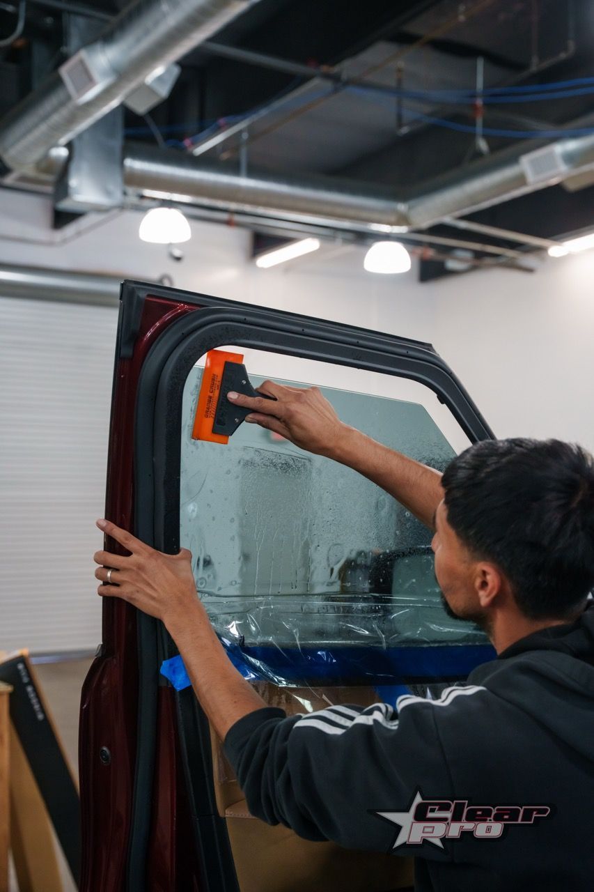 Applying window tint to a corvette
