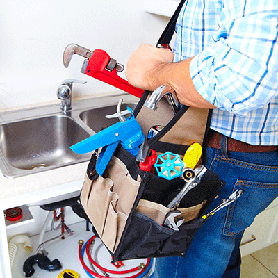plumbing at a kitchen sink for maintenance