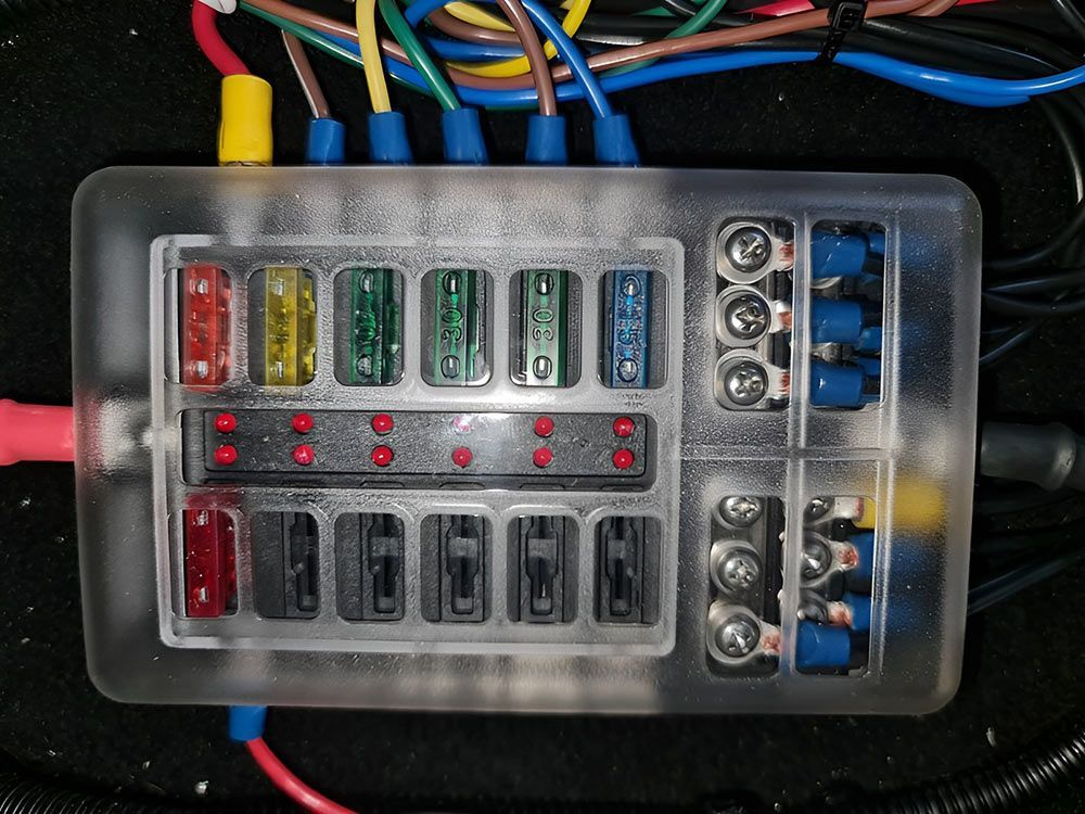 A Fuse Box With A Bunch Of Wires Coming Out Of It — Ballarat Auto Sparky in Sebastopol, VIC